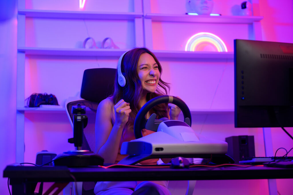 young-asian-pretty-woman-pro-gamer-have-live-streaming-playing-video-game-racing-game-home